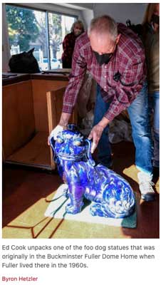 Ed Cook unpacks the precious Foo Dogs at the newly preserved Fuller Dome Home in Carbondale.
