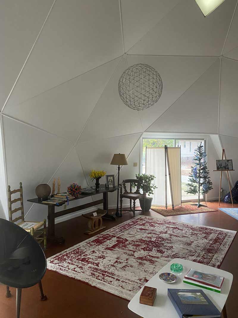 Living room with sphere Fuller Dome Home