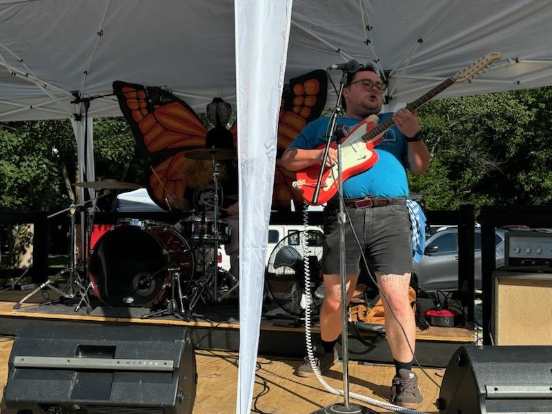 A musician performs on stage during live entertainment at the 2026 Bucky's Birthday Block Party in Carbondale, Illinois.